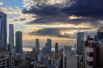 New York city skyline. Aerial view of NY Manhattan skyscrapers, cloudy sky at sunset