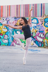Obraz na płótnie Canvas Young Girl Ballet Dancer in Urban Street Wynwood Florida