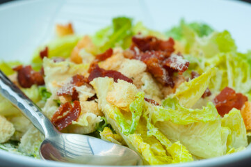 Caesar Salad with crispy roasted bacon and crisy bread.