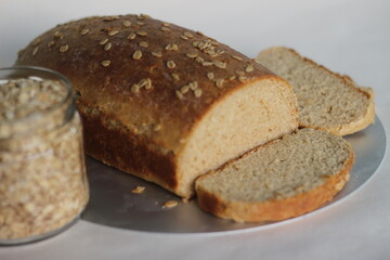 Slices of bread baked with whole wheat and oats.