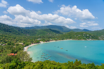 Beautiful tropical sand beach and blue sea water with coconut palm tree in paradise island, Thailand. Travel concept. Top view