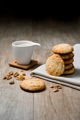 A tasty english breakfast. Homemade walnut scones with a cup of espresso. Wooden texture background with space for text