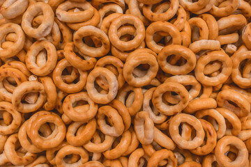 Pile of bagels snack or drying bagels lunch food texture background, close-up