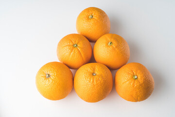 fresh oranges in a transparent plastic bag