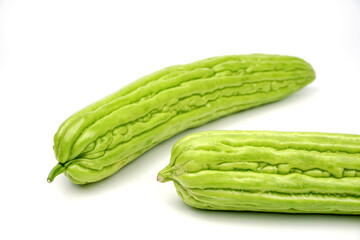 Fresh bitter gourd isolated on white background.	