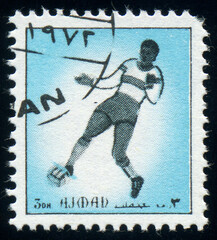 Football (soccer) player, Ajman stamp circa 1972