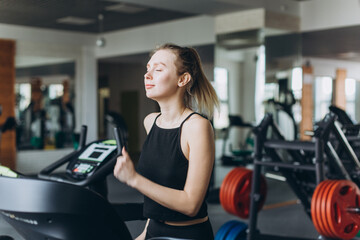 Girl doing exercise in the gym. Sport, healthy lifestyle concept