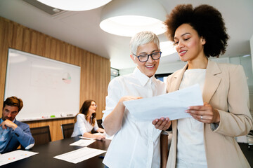 Portrait of successful business team working in office