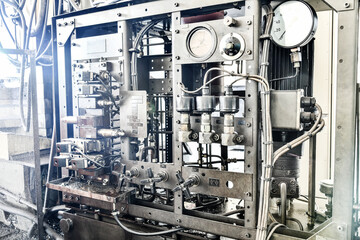 Fototapeta na wymiar Hydraulic oil station for metal-cutting machine control.