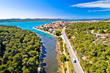 Adriatic town of Pirovac and Adriatic main road panoramic aerial view