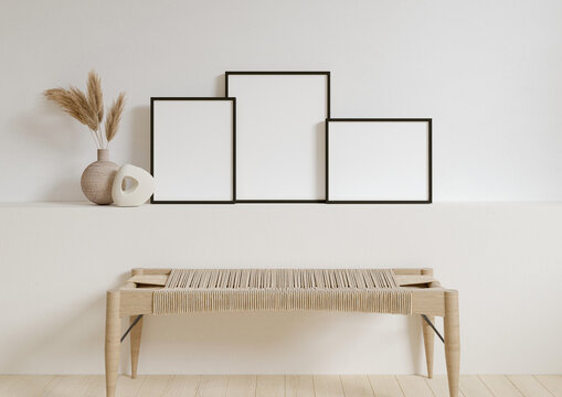 Three 8x10 Vertical and Horizontal Black Frame mockup with decorations on white wall. 3D Rendering