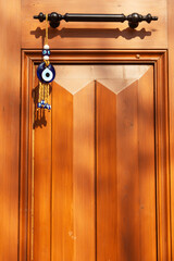 An amulet in the form of an eye against the evil eye. Blue Turkish eyes on the front door of the...