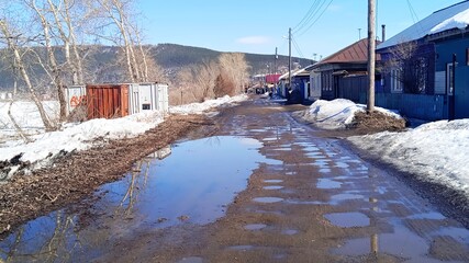 Off-road in the city, puddles and mud, russia