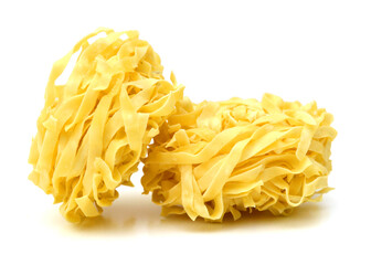 Egg noodles on a white background