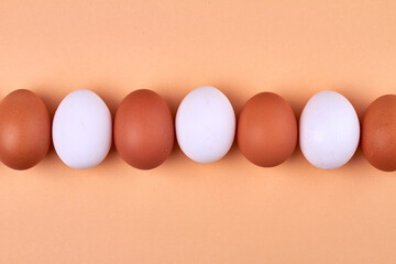 Alternation of white and brown eggs.