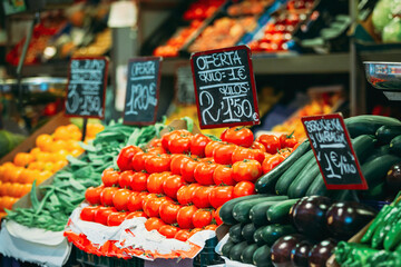 Spain. Tomatoes, courgettes and other agricultural products of local farmers in the grocery market