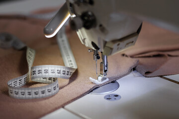 sewing machine with cloth and measuring tape