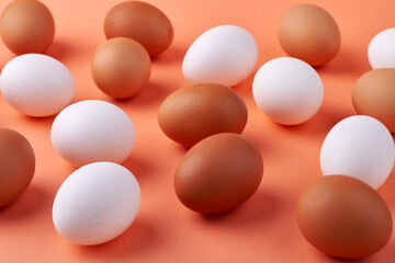 Close-up white and brown boiled eggs.