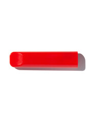 Disposable e-cigarette in red color on white isolated background. The concept of modern smoking, vaping and nicotine. Top view