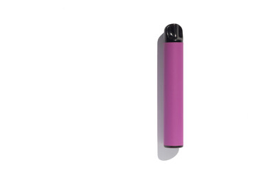 Disposable e-cigarette in purple color on white isolated background. The concept of modern smoking, vaping and nicotine. Top view