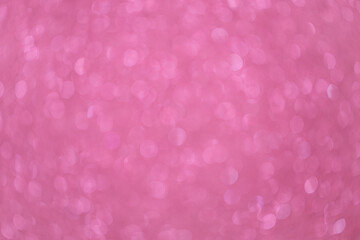 Festive blurred pink background with numerous bokeh, with place for text. Holidays concept, Valentine's Day, Happy Birthday, Baby Shower Day. For social media. Horizontal