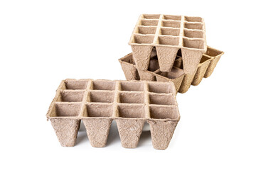 Compostable gardening, cell packs made out of peat fiber, isolated on white.