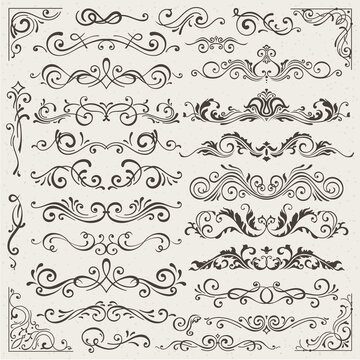 set of calligraphic design elements and page decorations. Elegant collection of hand drawn swirls and curls for your design. Isolated on beige background