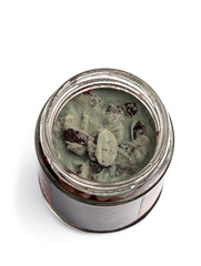 Closeup of mould growing on berry jam isolated on white