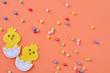 Hatched chicks and multicolored beads.