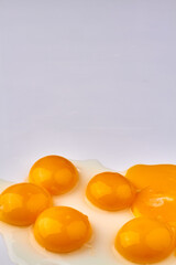 Vertical shot chicken egg yolks.