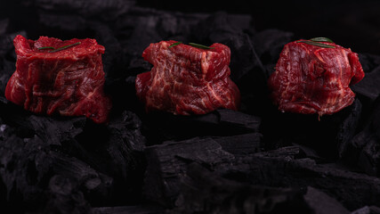 barley steaks marble meat for the dish fillet mignon. Low key, dark background. Flat lying, on top. place for inscription