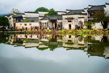 reflection of town in the lake