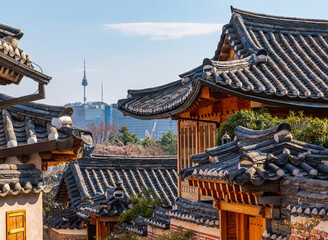 Panorama of modern Seoul and traditional Korean houses in Bukchon Hanok Village