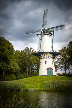 Windmill in Tholen Netherlands dramatic sky and water