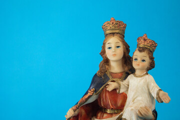 Mary Help of Christians on a blue background