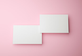 Obraz na płótnie Canvas 3d Render. Two business cards mockup on pink background. Business and branding identity concept
