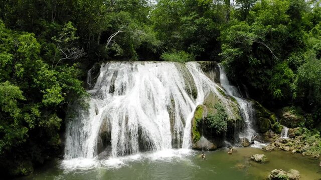 aerial image with drone of a beautiful waterfall in the middle of the forest in the Pantanal region Mato Grosso do Sul Brazil