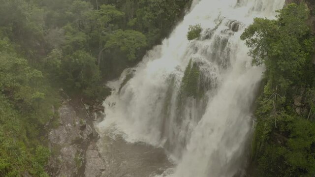 aerial image with drone of the waterfall with large volume of water in Chapada dos Veadeiros