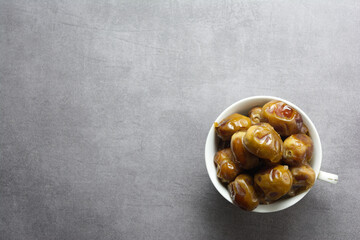 dates in a white glass
