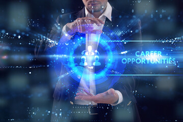 Business, Technology, Internet and network concept. Young businessman working on a virtual screen of the future and sees the inscription: Career opportunities
