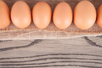 A row of raw eggs