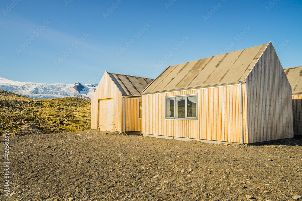 Sticker Beautiful view of a typical Icelandic house against a blue sky