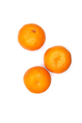 several tangerines on a white background top view