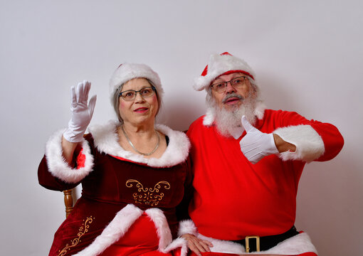 Mr And Mrs Santa Claus Enjoying Each Other's Company