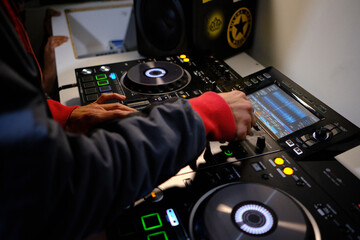 dj at the party mixing music electronic turntable hand