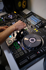 Fototapeta na wymiar dj mixing music hands turntable electronic music