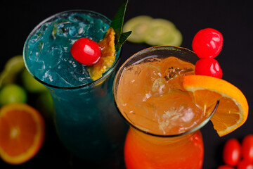 cocktails  with ice cherries beverage alcohol delicious blue  orange lemon alcohol mixer