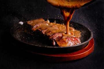 meat sirloin gourmet food eat delicious sauce pouring