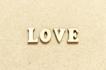 Alphabet letter in word love on wood background