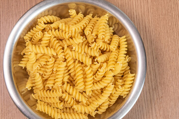 Raw pasta in bowl - macro detail